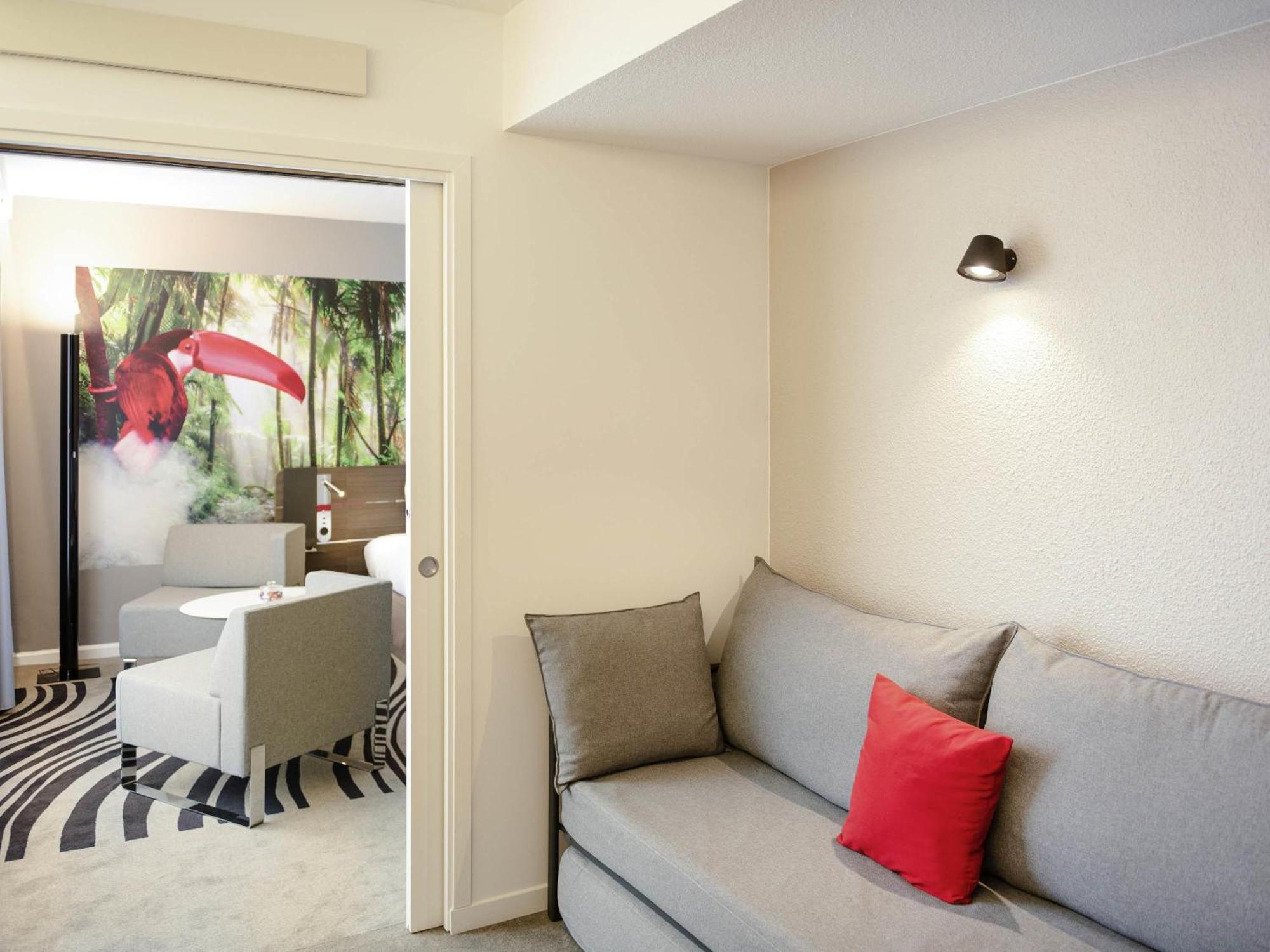 Suite met 1 queensize bed en een slaapbank
